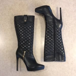 Liliana size 8 black leather tall shafted boots.